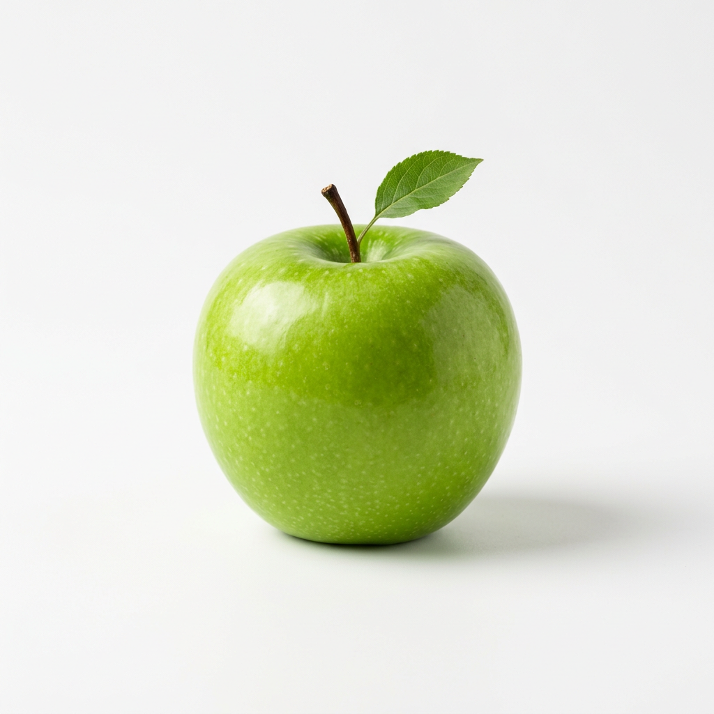 A ripe green apple on a seamless white background with soft 