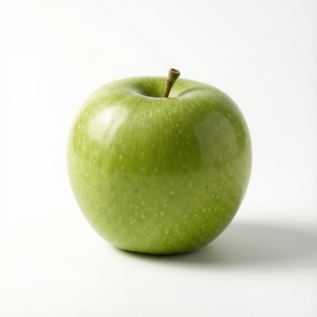 A ripe green apple on a seamless white background with soft 