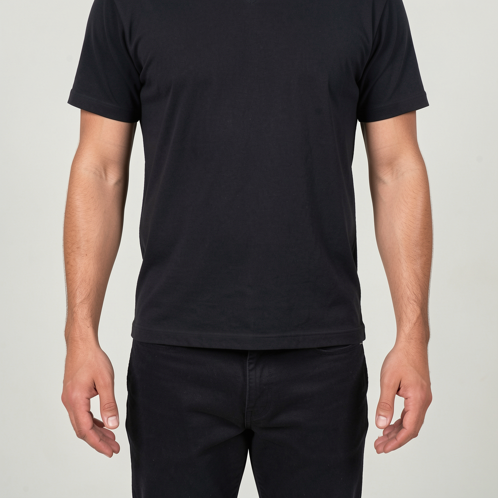A person standing with both hands visible at their sides, fi