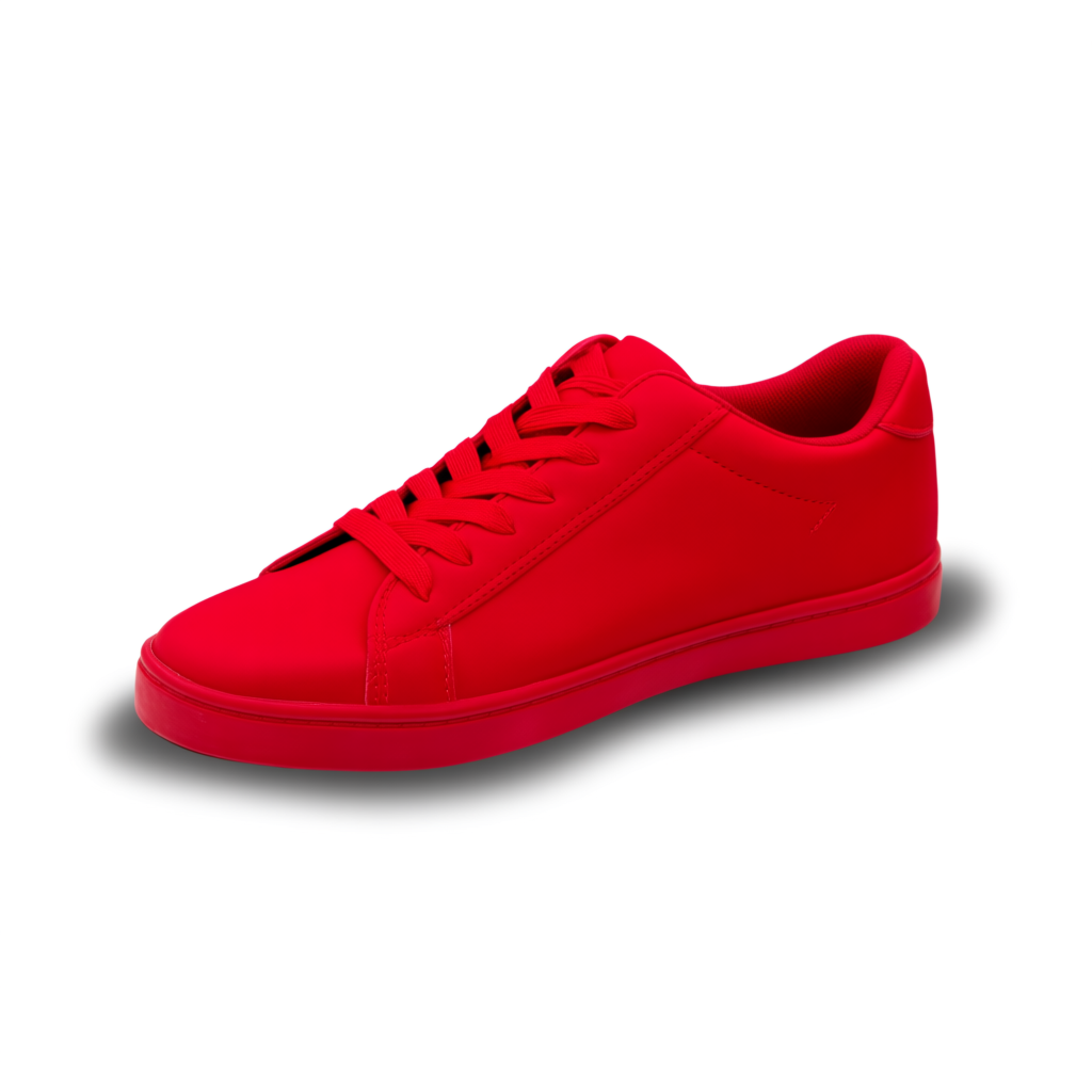 A single red sneaker on a clean white background with soft s