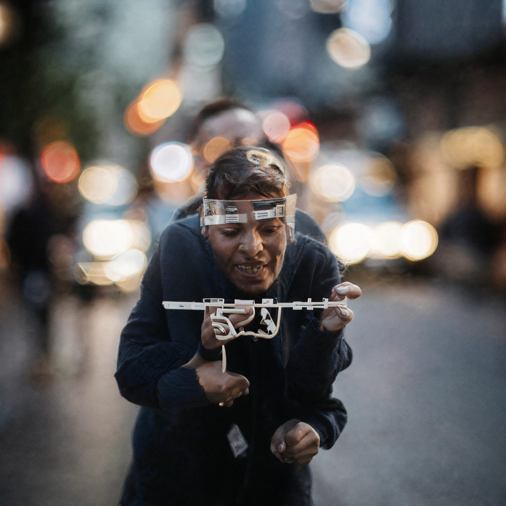 A street photograph with shallow depth of field as if shot a