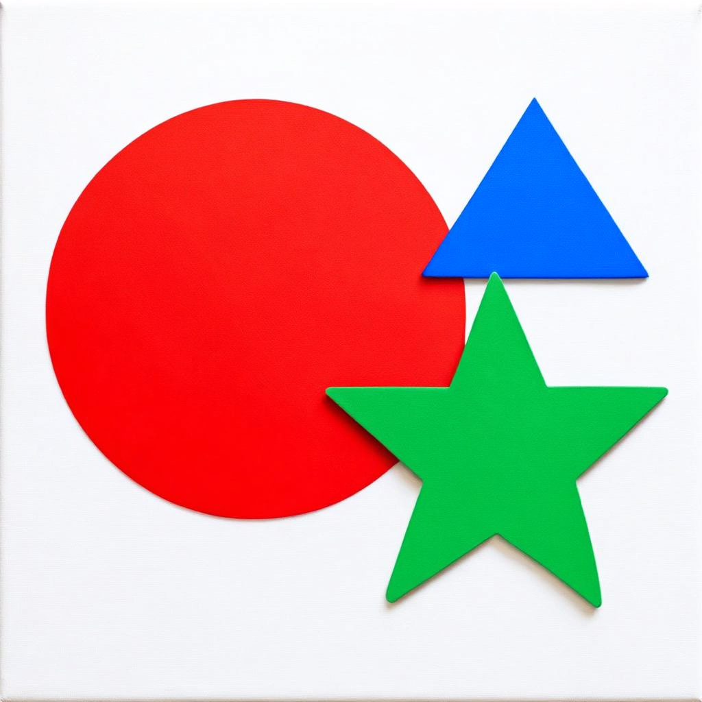 A large red circle, a small blue triangle, and a medium gree