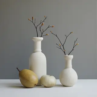 A still life painted in anxious minimalism — sparse composit