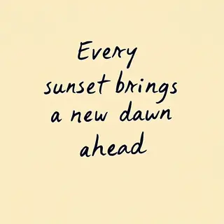 'Every sunset brings a new dawn ahead' written neatly on a p