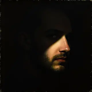 A portrait lit with classic Rembrandt lighting — triangle of