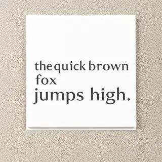 The sentence 'The quick brown fox jumps high' in clean black