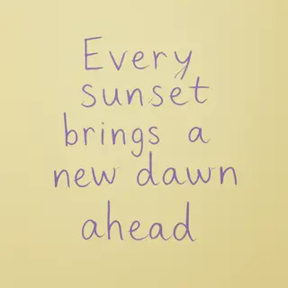 'Every sunset brings a new dawn ahead' written neatly on a p