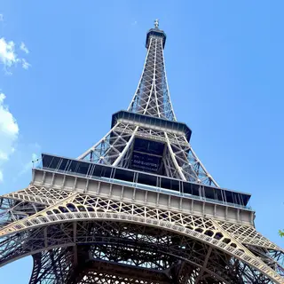The Eiffel Tower in Paris on a clear day, architecturally ac