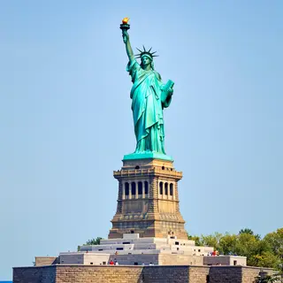 The Statue of Liberty on her island pedestal, with correct t