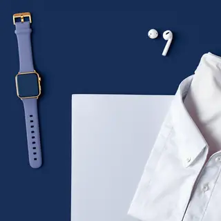 A product flat-lay on a #1A1A2E (deep dark blue) background,