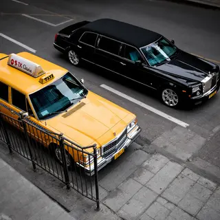 A yellow taxi and a black limousine parked next to each othe