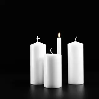 Exactly 4 white candles standing on a dark surface