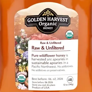 A product label for 'GOLDEN HARVEST ORGANIC HONEY' with subt