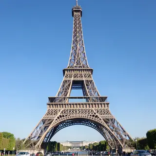 The Eiffel Tower in Paris on a clear day, architecturally ac