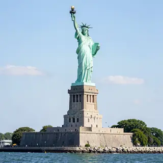 The Statue of Liberty on her island pedestal, with correct t