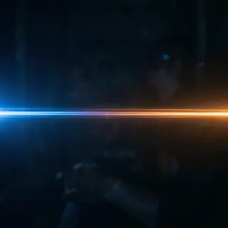 A cinematic frame with blue and orange anamorphic lens flare