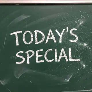 The phrase 'TODAY'S SPECIAL' written in white chalk on a dar