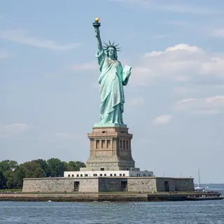 The Statue of Liberty on her island pedestal, with correct t