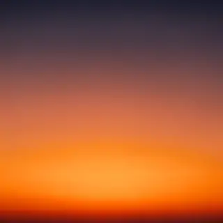 A sunset sky gradient on a flat surface from #FF6B35 (orange