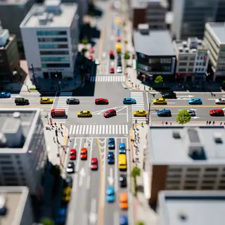 A tilt-shift photograph of a city street making real-life lo