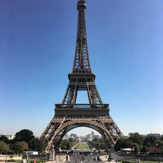 The Eiffel Tower in Paris on a clear day, architecturally ac