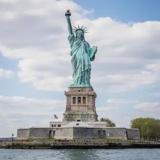 The Statue of Liberty on her island pedestal, with correct t