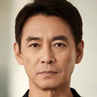 A portrait of a middle-aged man with a calm, serious express