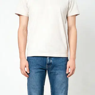 A person standing with both hands visible at their sides, fi