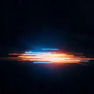 A cinematic frame with blue and orange anamorphic lens flare