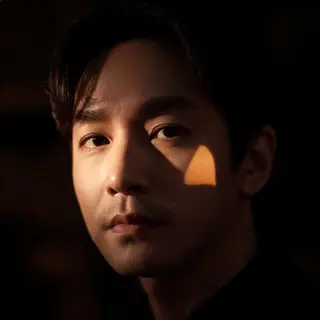 A portrait lit with classic Rembrandt lighting — triangle of