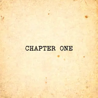 The word 'CHAPTER ONE' typed on aged paper with a vintage ty