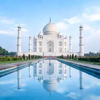 The Taj Mahal in Agra seen from the reflecting pool, with ac