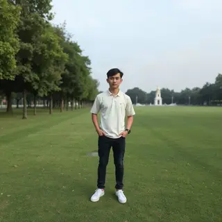 A person standing in a neutral pose in a park, full body vis