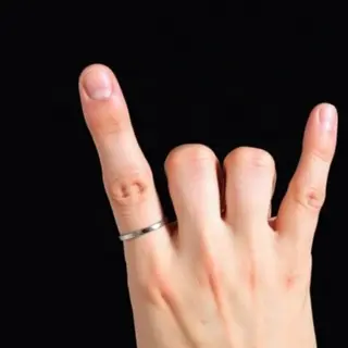 A person counting to three on their fingers, with index, mid