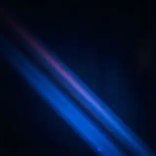 A cinematic frame with blue and orange anamorphic lens flare