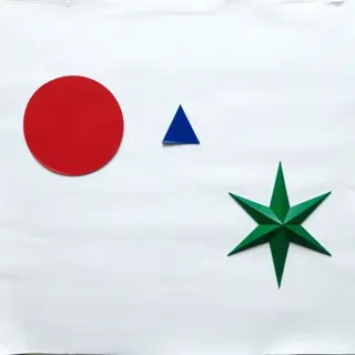 A large red circle, a small blue triangle, and a medium gree
