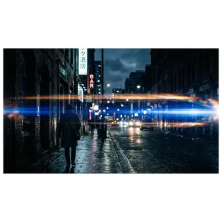 A cinematic frame with blue and orange anamorphic lens flare
