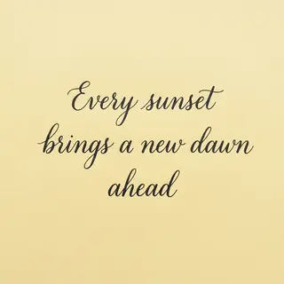 'Every sunset brings a new dawn ahead' written neatly on a p
