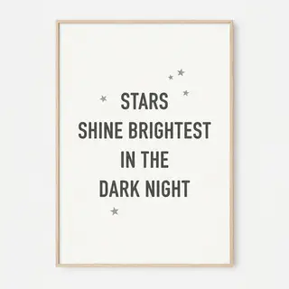 'Stars shine brightest in the dark night' displayed on a cle
