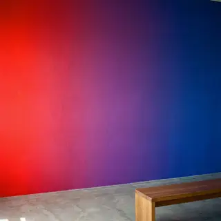 A smooth gradient on a wall going from #FF0000 (red) on the 