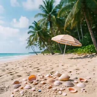 A sandy beach with palm trees, seashells, and a beach umbrel