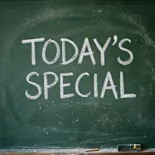 The phrase 'TODAY'S SPECIAL' written in white chalk on a dar