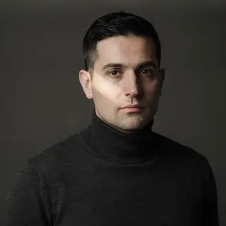 A portrait lit with classic Rembrandt lighting — triangle of