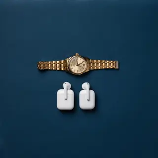 A product flat-lay on a #1A1A2E (deep dark blue) background,