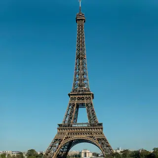 The Eiffel Tower in Paris on a clear day, architecturally ac