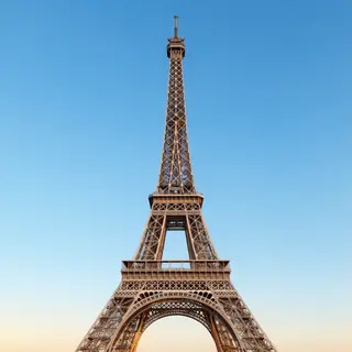 The Eiffel Tower in Paris on a clear day, architecturally ac