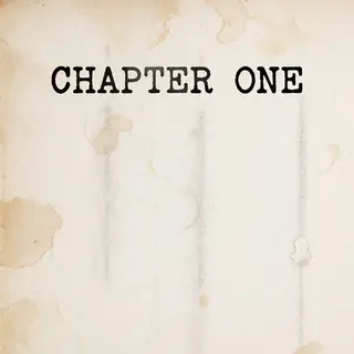 The word 'CHAPTER ONE' typed on aged paper with a vintage ty