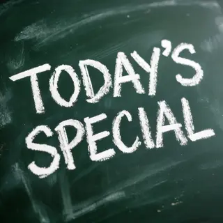 The phrase 'TODAY'S SPECIAL' written in white chalk on a dar