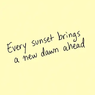 'Every sunset brings a new dawn ahead' written neatly on a p