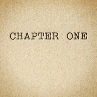 The word 'CHAPTER ONE' typed on aged paper with a vintage ty